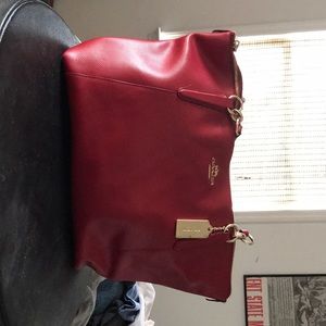 Red leather coach handbag